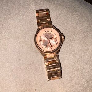 Michael Kors rose gold women’s watch